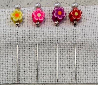 Assorted coloured flowers counting pins